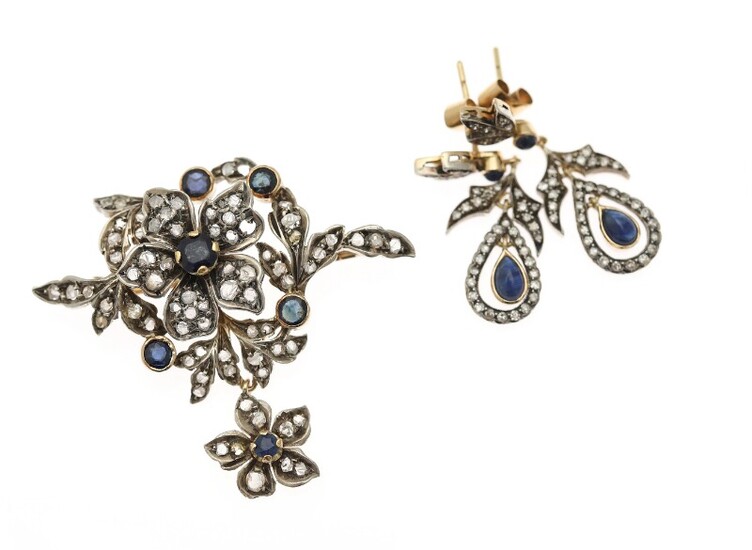 NOT SOLD. A sapphire and diamond jewellery set comprising a brooch and a pair of...