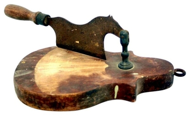 A scarce mid 19th century iron tobacco cutter in the