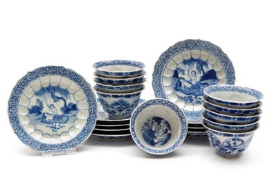 A set of nine blue and white 'Acupuncturist' cups and saucers