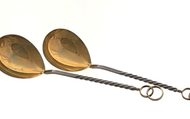 A special pair of 916 silver serving spoons, probably...