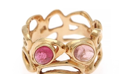 A tourmaline ring set with two cabochon pink tourmalines, mounted in 14k gold. Size 64.