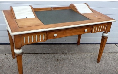 A writing desk with painted moulding, 140cm wide