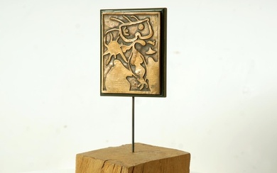 AFTER JOAN MIRO, bronze plaque, mounted onto wooden plinth, ...
