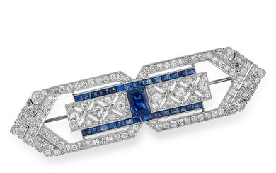 AN ART DECO DIAMOND AND SAPPHIRE BROOCH set with step