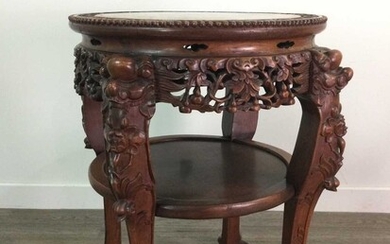 AN EARLY 20TH CENTURY CHINESE IRONWOOD PLANT TABLE