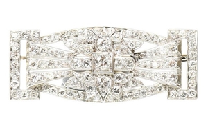 AN EXCEPTIONAL ART DECO DIAMOND BROOCH CIRCA 1925 OF RECTANGULAR GEOMETRIC PANEL FORM SET THROUGHOUT WITH OLD CUT AND BRILLIANT CUT DIAMONDS TO PIERCED