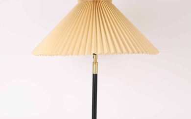 Aage Petersen for Le Klint. Table lamp with stem of black lacquered metal and brass.