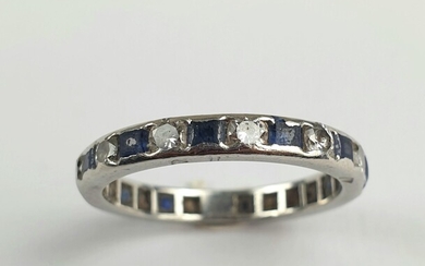 American ALLIANCE in platinum with staggered diamonds and blue stones,...