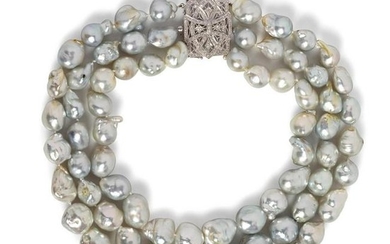 An 18 Karat White Gold, Cultured Baroque Pearl and