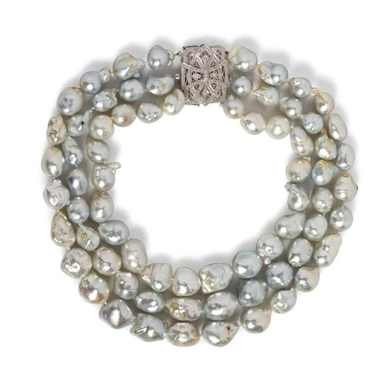 An 18 Karat White Gold, Cultured Baroque Pearl and