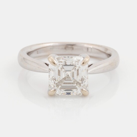 An 18K white gold ring set with an Asscher-cut diamond