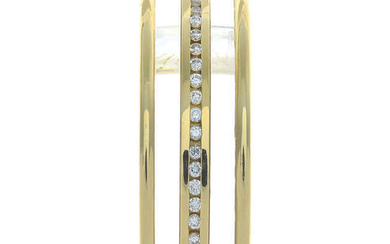 An 18ct gold colourless sapphire and brilliant-cut diamond pendant.