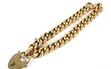 An 18ct gold curb link bracelet with heart locket, the locket hallmarked Sheffield 1930, 19.