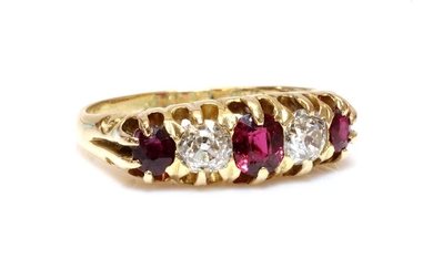 An 18ct gold red spinel, ruby and diamond boat shaped ring, c.1900