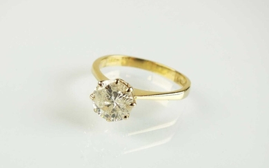 An 18ct gold single stone diamond ring