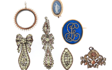 An 18th century foliate pendant set with topaz in a silver closed-back mount