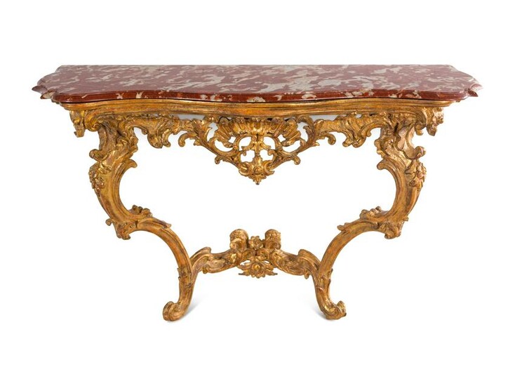 An Italian Carved Giltwood Marble-Top Console Table
