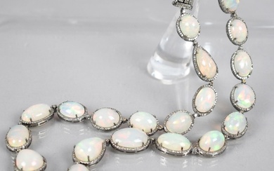 An Opal and Diamond Necklace, 23 Mixed Shape Matched Opals C...