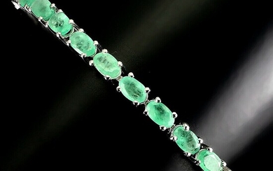 NOT SOLD. An emerald bracelet set with numerous oval-cut emeralds, mounted in rhodium plated sterling...