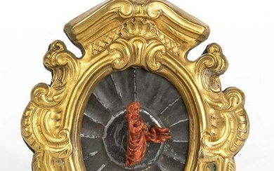 An italian Mediterranean coral carving with metal frame