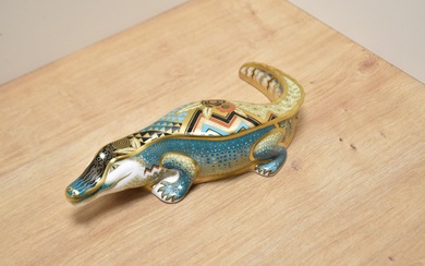 An unusual Royal Crown Derby bone china Alligator paperweight with gilt, stylised and geometric