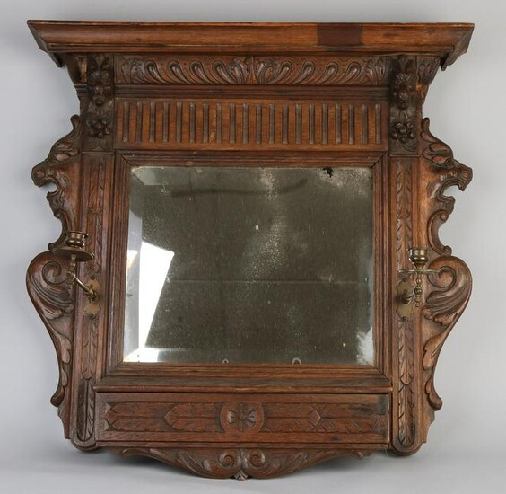 Antique Malinois oak carved mirror with candle holders