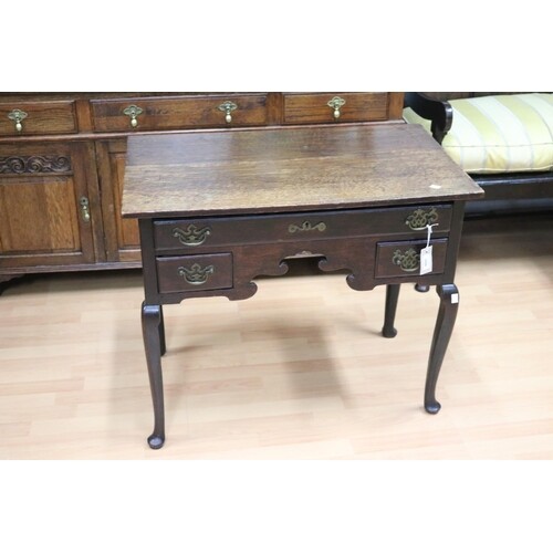 Antique mid 18th century English oak lowboy, with later top,...