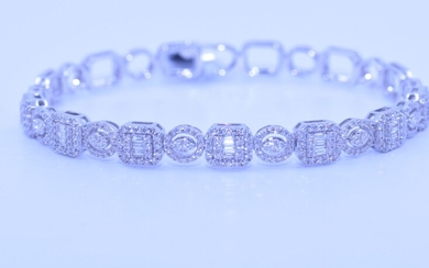 Bracelet or blanc 18ct. (poinçon 750) avec brillants et diamants taille baguette en totale +-...