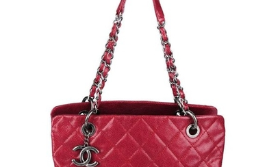 CHANEL - a quilted Caviar leather handbag. Featuring