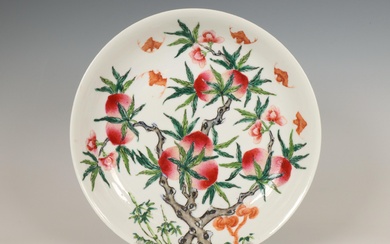 China, a famille rose 'nine peaches' plate, late 19th/ 20th century