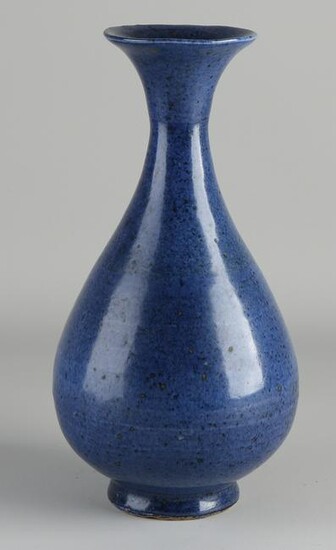 Chinese porcelain vase with blue glaze.