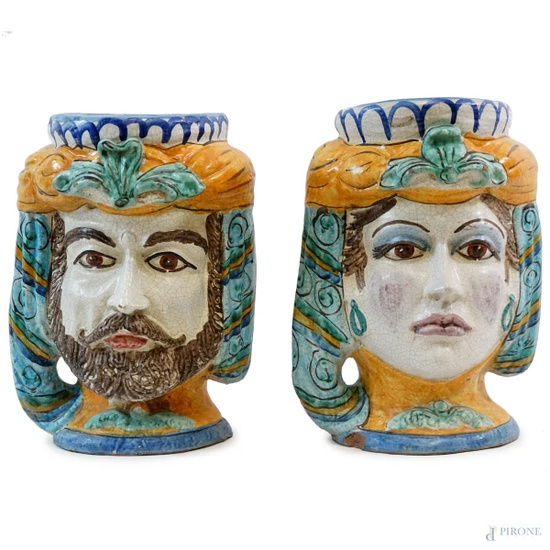 Coppia di vasi in ceramica "Testa di moro", Caltagirone, XX secolo, h cm 50, firmati e datati, (difetti)