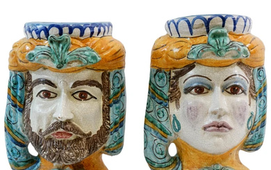 Coppia di vasi in ceramica "Testa di moro", Caltagirone, XX secolo, h cm 50, firmati e datati, (difetti)