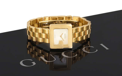 Description A LADY'S GOLD WRISTWATCH BY GUCCI, the mother-of-pearl...