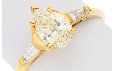 Diamond, Gold Ring The ring features a pear-shaped yellow...
