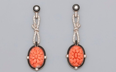 Earrings in white gold, 750 MM, decorated with onyx and diamond ribbons around coral engraved with a blooming flower, 1.3 x 4.5 cm, weight: 12.85gr. rough.