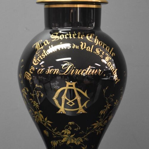 Extremely rare covered vase in black and gold hyalite glass...