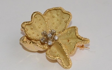 Flower brooch in gold (750) with semi amati...
