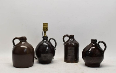 Four Stoneware Small Handled Jugs