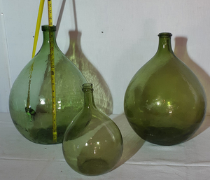 GROUP OF 4 GLASS BULBOUS FORMED DEMIJOHNS