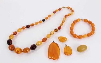 Group of amber jewellery including a bracelet with 9ct gold clasp