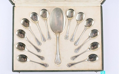 Ice cream set in silver, with purple handles decorated with fillets and acanthus leaves, including twelve ice cream spoons and a serving scoop