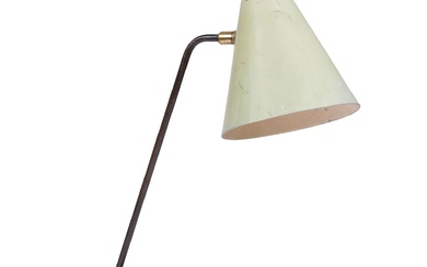JACQUES BINY (1913-1976) & LUMINALITE 303 Lampe de bureau à lumière orientable. La base circulaire...