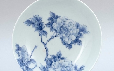 JAPANESE BLUE AND WHITE NABESHIMA DISH Interior with peony design. Exterior with flower design and combed foot. Diameter 8.25".