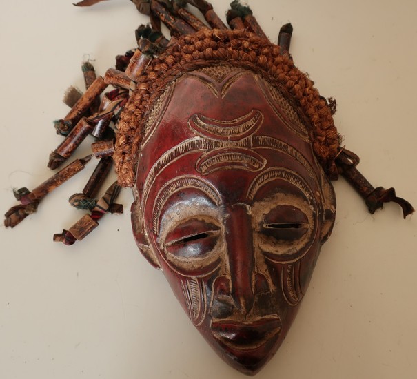 Large carved African style carved tribal face mask with high...