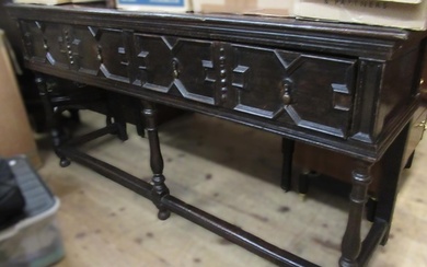 Oak dresser base in 17th Century style, with two geometric m...