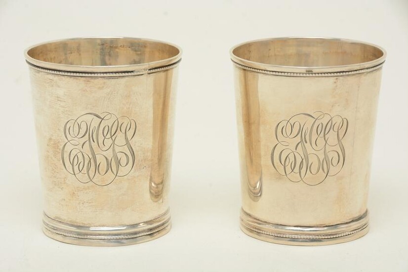 Pair of silver julep cups, mid-19th C. One appears to