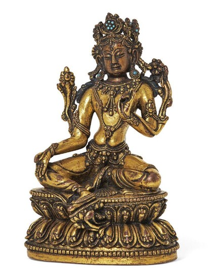 Property of a Gentleman (lots 36-85) A Sino-Tibetan gilt-bronze figure of Green Tara, 17th/18th century, finely cast seated in lalitasana on a double-lotus base with hands held in varada and vitarkamudra, each issuing a flowering lotus stem, her...