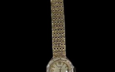 ROTARY; a 9ct yellow gold lady's wristwatch on 9ct yellow...