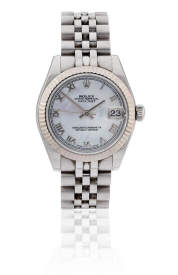 Rolex. A mid-sized stainless steel automatic bracelet watch with mother-of-pearl dial, Datejust 31, Ref 178274, Serial Number D858020, c. 2005 Mother-of- pearl dial with applied white gold Roman hourly numerals and outer printed minute track, gold...